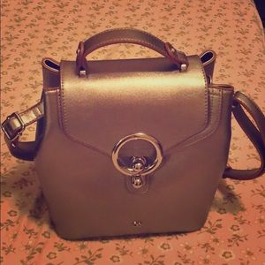 It is a perfect size and beautiful bag!